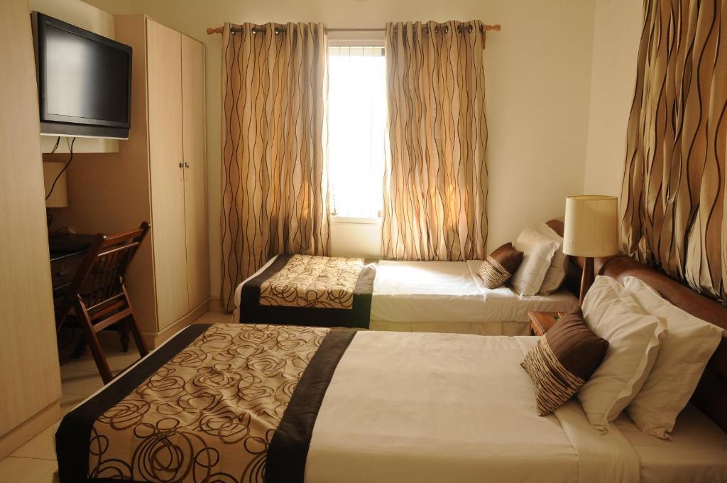 Executive Comfort Alwarpet Madrás Habitación foto